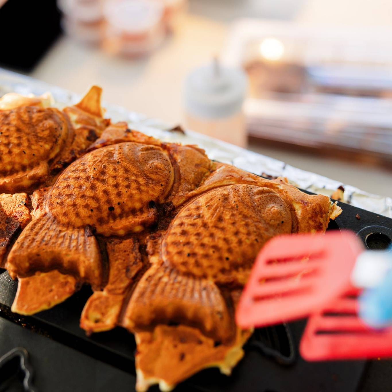 Waffles cook in griddle